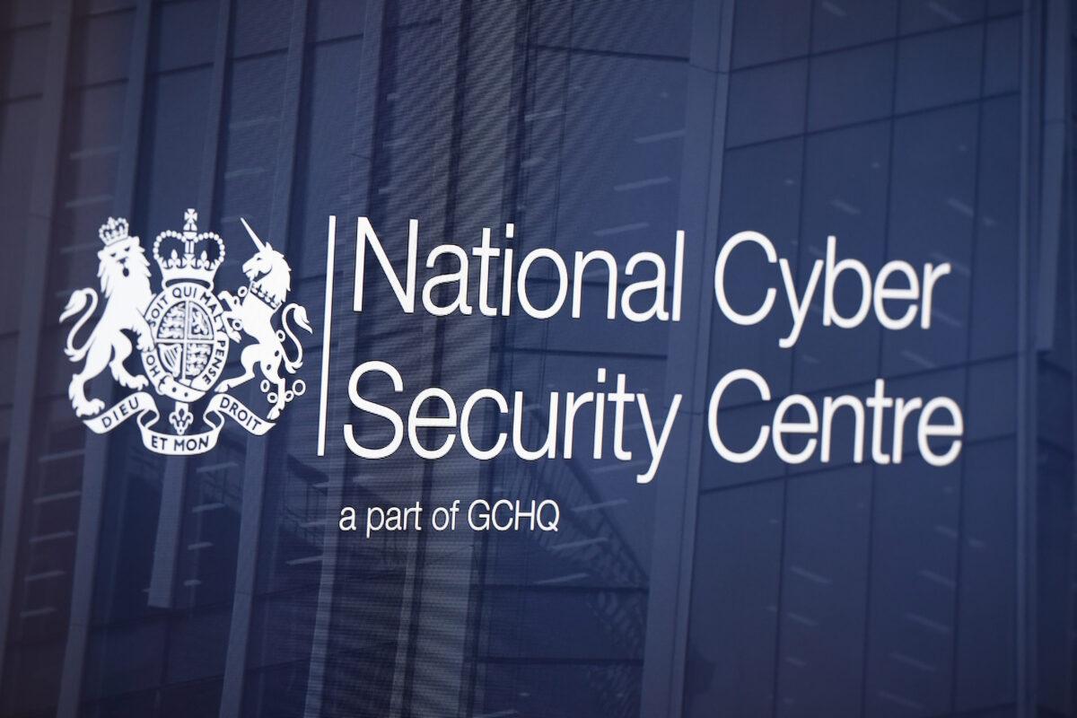 A logo is displayed on a television screen in the National Cyber Security Centre in London, on Feb. 14, 2017. (Carl Court/Getty Images)