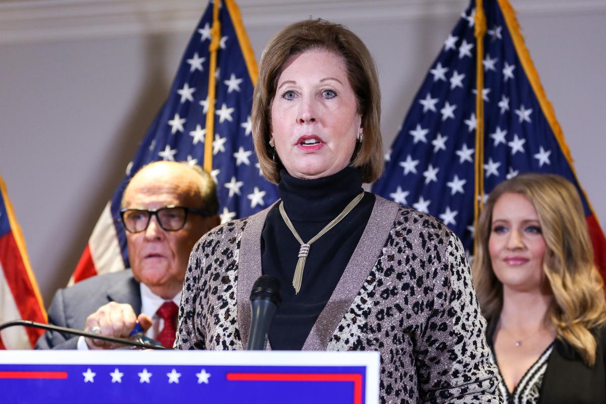  Trump campaign lawyer Sidney Powell speaks to media while flanked by Trump lawyer and former New York City Mayor Rudy Giuliani (L) and Trump campaign senior legal adviser Jenna Ellis at a press conference at the Republican National Committee headquarters in Washington on Nov 19, 2020. (Charlotte Cuthbertson/The Epoch Times)
