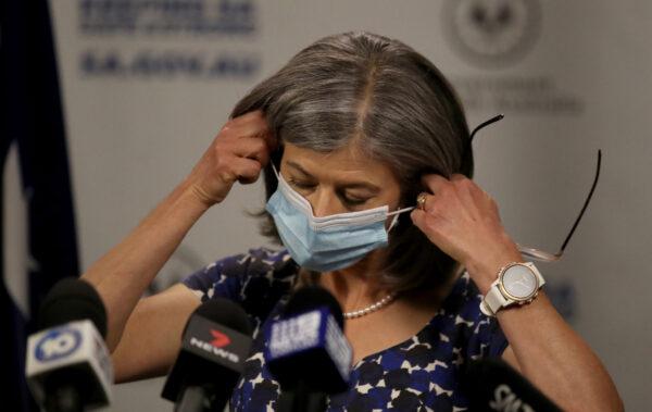 South Australian Chief Health Officer Nicola Spurrier removes her mask during the COVID-19 daily update in Adelaide, Australia on Nov. 18, 2020. (Kelly Barnes/Getty Images)