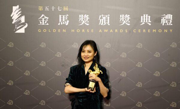 Director Jill Li of "Lost Course" poses with her Best Documentary award at the 57th Golden Horse Awards in Taipei, Taiwan, on Nov. 21, 2020. (Ann Wang/Reuters)