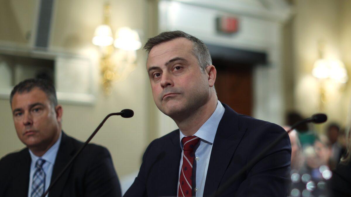 President and CEO of Election Systems & Software Tom Burt and President and CEO of Dominion Voting Systems John Poulos testify during a hearing before the House Administration Committee, on Capitol Hill in Washington, on Jan. 9, 2020. (Alex Wong/Getty Images)