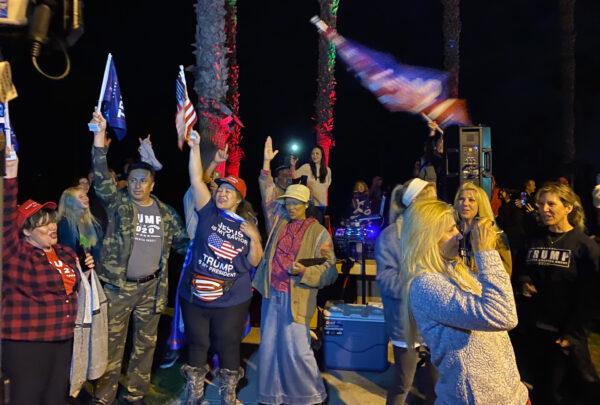 People gather to protest the curfew in San Clemente, Calif., on Nov. 21, 2020. (Jack Bradley/The Epoch Times)