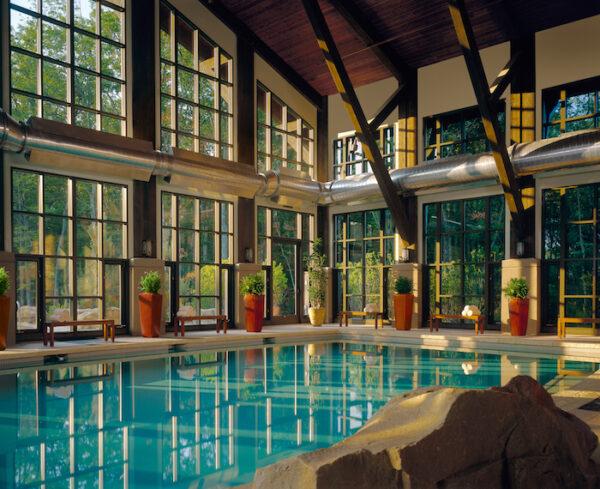 The spa’s indoor Aqua Garden features two cascading hydromassage hot tubs and a pool. (Courtesy of Woodloch)