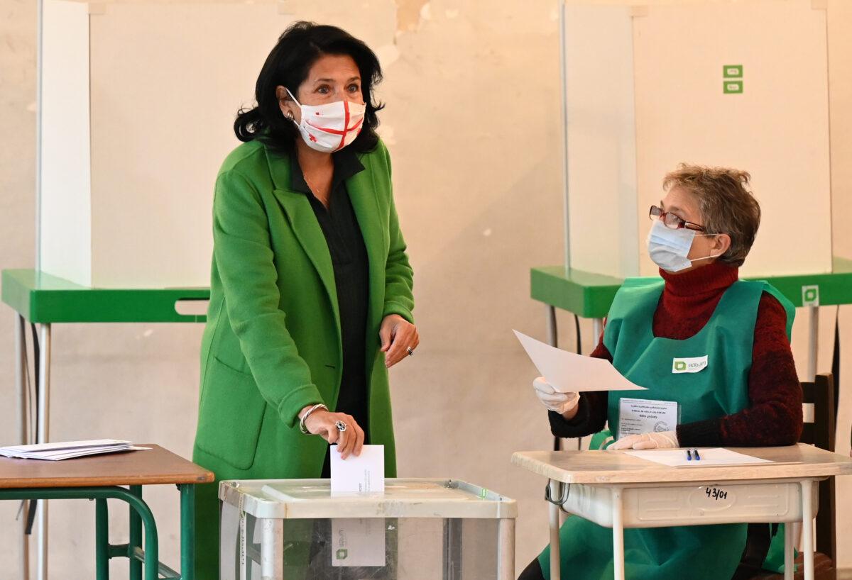 Georgian President Salome Zurabishvili casts her ballot at a polling station during Georgia's parliamentary runoff elections amid the COVID-19 pandemic in Tbilisi, Georgia, on Nov. 21, 2020. (Vano Shlamov/AFP via Getty Images)