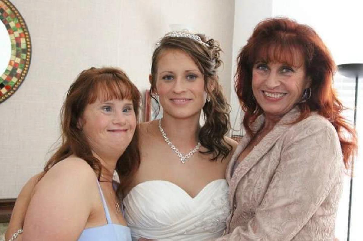 Maryanne and Lindi on her wedding day, alongside mom Linda. (Caters News)
