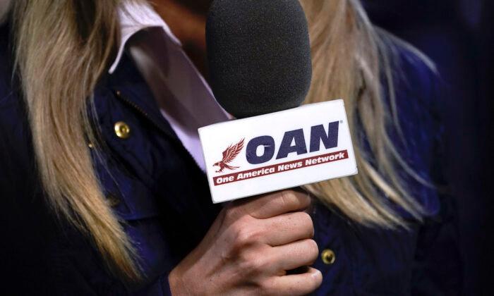 OAN Fails to Reach Agreement With Verizon, Will Be Removed From Carrier’s TV Lineup