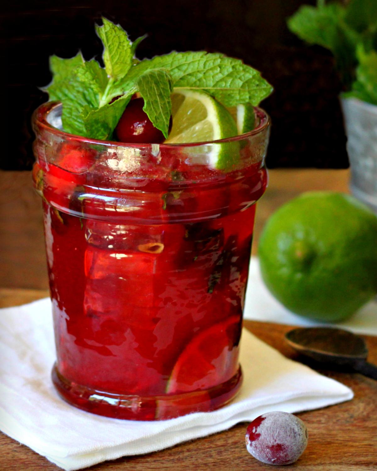 This bright and festive bourbon cocktail incorporates cranberries in three ways. (Lynda Balslev for Tastefood)