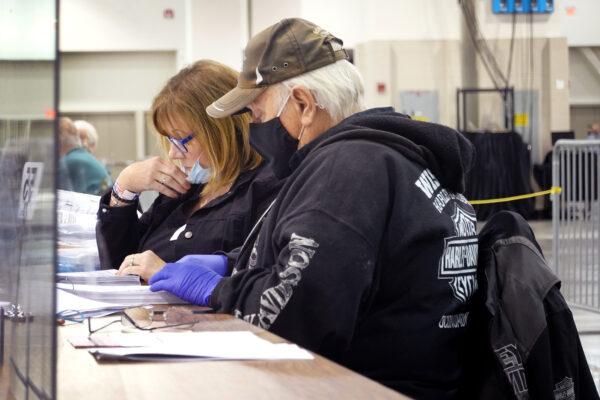 Election officials begin the recount process of ballots from the Nov. 3, 2020, election at the Wisconsin Center in Milwaukee on Nov. 20, 2020. (Scott Olson/Getty Images)