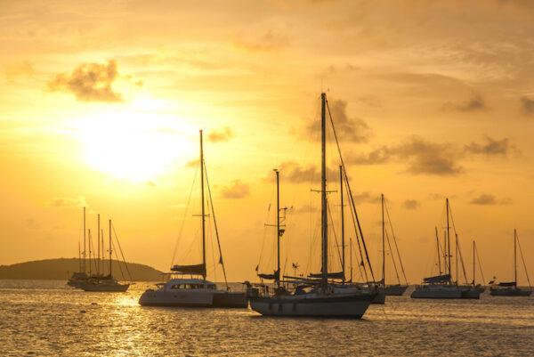 Moored boats at sunset. (starryvoyage/Shutterstock)