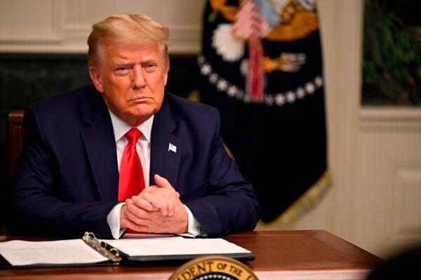 President Donald Trump participates in a Thanksgiving teleconference with members of the military at the White House in Washington on Nov. 26, 2020. (Andrew Caballero-Reynolds/AFP via Getty Images)