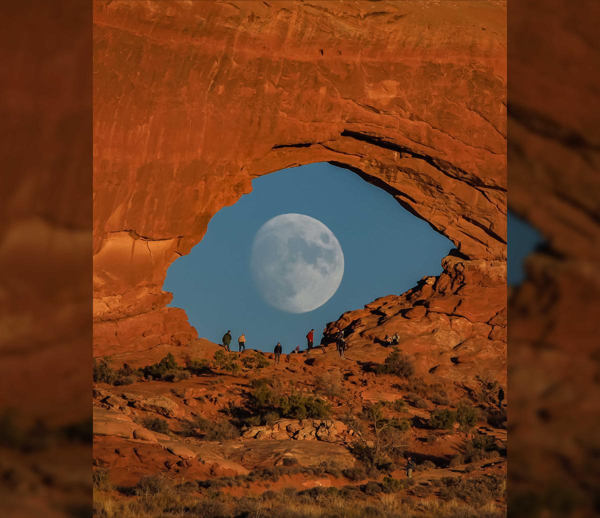 In Zach's photos, the full moon is seen passing across the arch and hovering in the middle of it so that the image looks like a huge and mysterious eye. (Caters News)