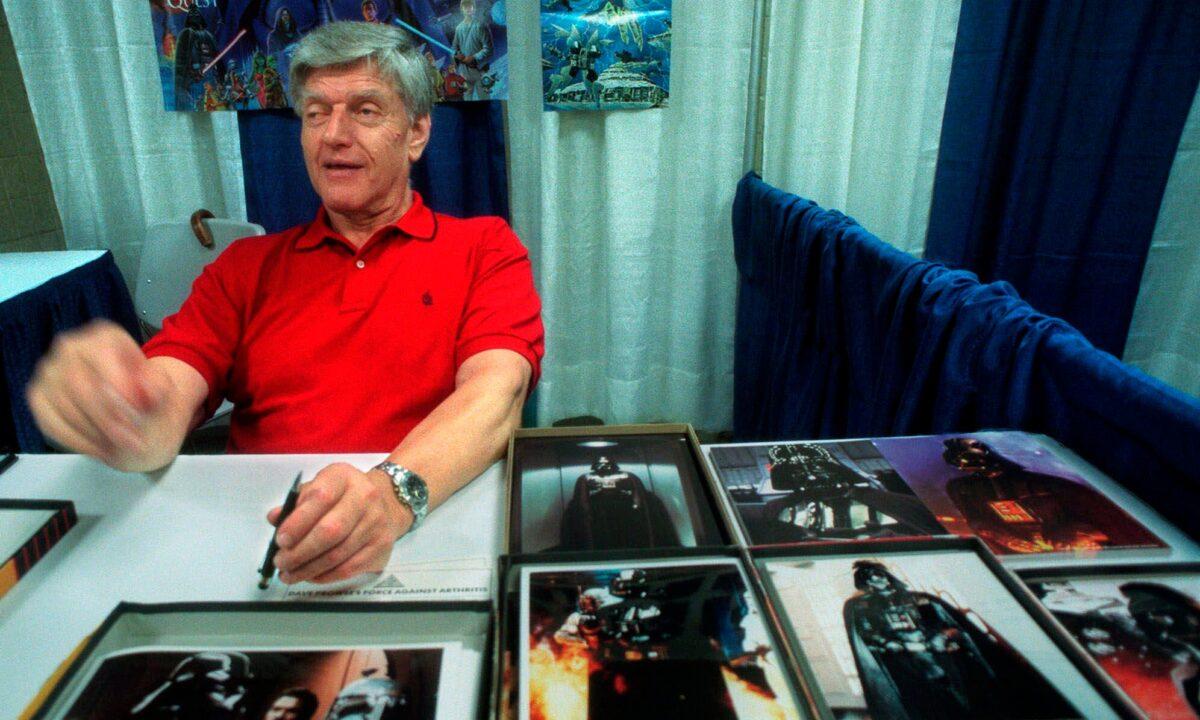 Dave Prowse, the original Darth Vader from the "Star Wars Trilogy," poses during the New York Comic and Fantasy Creators Convention, on May 7, 1999. (Lynsey Addario/AP Photo)