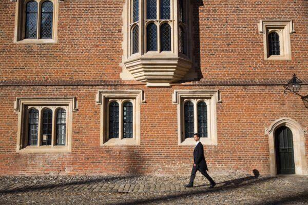 In this file image, a student walks in front of Eton College, in Eton, west of London, on Oct. 1, 2015. (Jack Taylor/AFP via Getty Images)