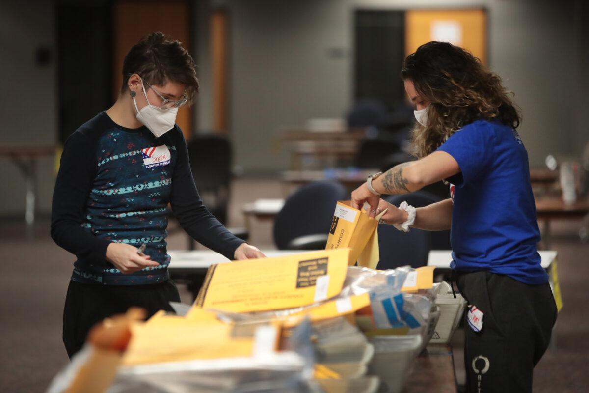 Election officials count absentee ballots in Milwaukee, Wis. on Nov. 4, 2020. (Scott Olson/Getty Images)