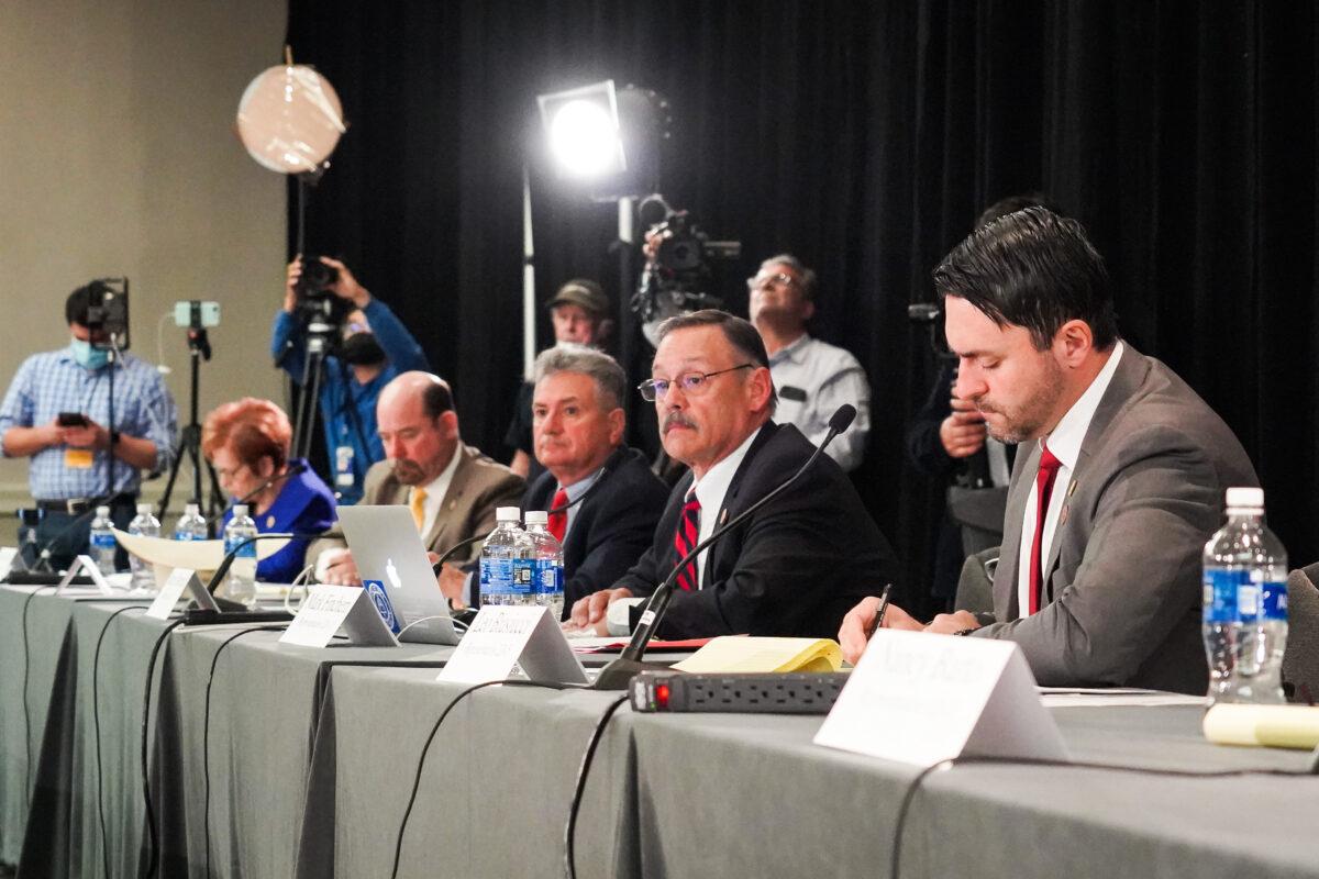 Lawyers for President Donald Trump and members of the Arizona Legislature hold a public hearing on election integrity in Phoenix, Ariz., on Nov. 30, 2020. (Mei Lee/The Epoch Times)