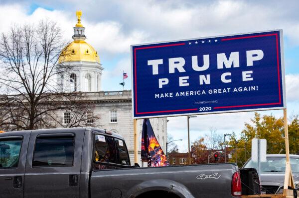 A campaign sign for Donald Trump sits outside a polling station by the state capitol on Election Day in Concord, N.H., on Nov. 3, 2020. (Joseph Prezioso/AFP via Getty Images)