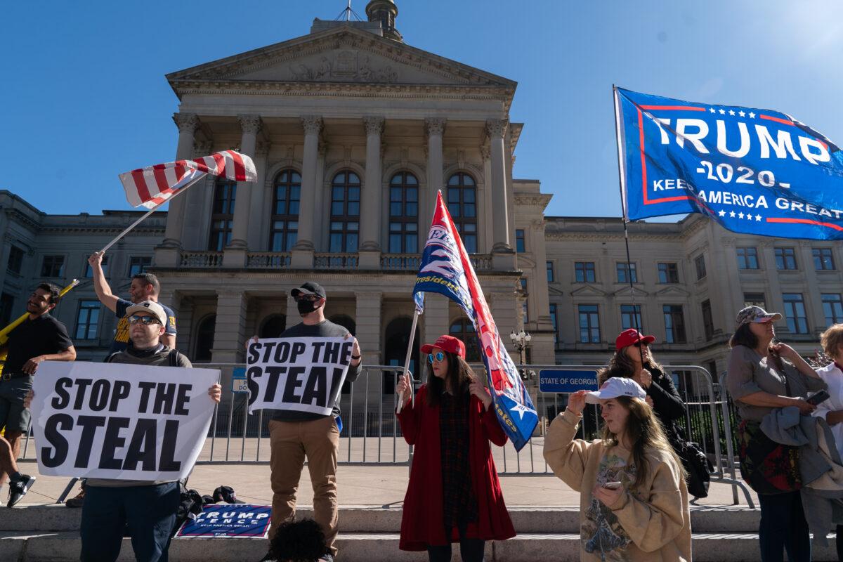Pro-President Donald Trump protesters rally against the results of the presidential election outside the Georgia State Capitol in Atlanta, Ga., on Nov. 18, 2020. (Elijah Nouvelage/Getty Images)