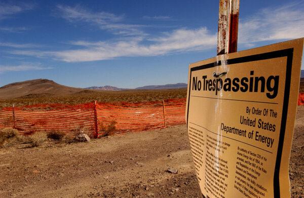 A "no trespassing" sign warns people to stay away from the proposed nuclear waste dump site of Yucca Mountain at Nellis Air Force Base, located approximately 90 miles north of Las Vegas, Nev., on Feb. 7, 2002. (David McNew/Getty Images)