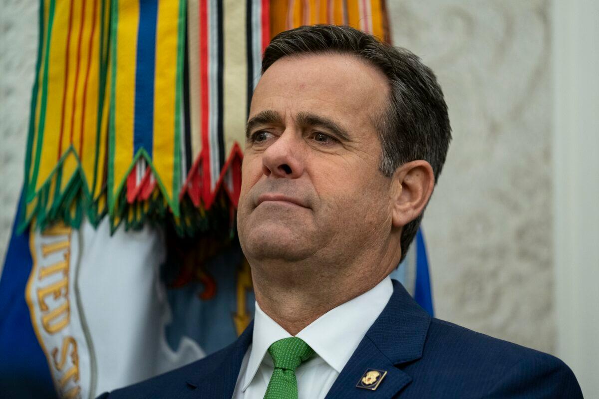 Director of National Intelligence John Ratcliffe watches during a ceremony in the Oval Office of the White House in Washington on Dec. 3, 2020. (Evan Vucci/AP Photo)