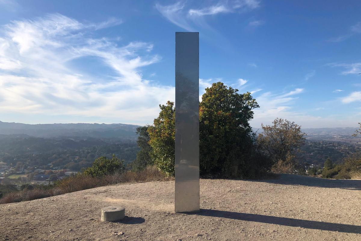  Days after the discovery and swift disappearance of two shining metal monoliths half a world apart, another towering structure has popped up, this time at the pinnacle of a trail in Southern California. (Kaytlyn Leslie/The Tribune (of San Luis Obispo) via AP)