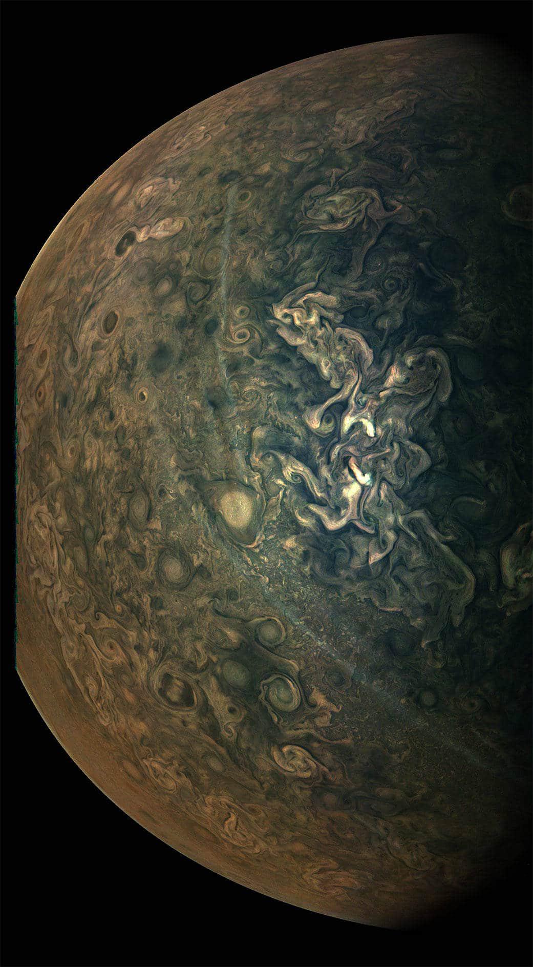 A shot of <a href="https://solarsystem.nasa.gov/planets/jupiter/overview/">Jupiter</a>'s tumultuous northern regions during Juno's close approach to the planet on Feb. 17, 2020. (<a href="https://www.jpl.nasa.gov/spaceimages/details.php?id=PIA23802">NASA/JPL/SwRI/MSSS; Image processing by Gerald Eichstädt</a>)