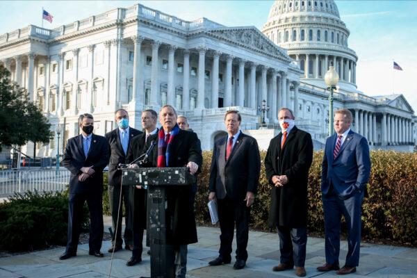 Rep. Andy Biggs (R–Ariz.) speaks alongside members of the House Freedom Caucus during a press conference outside the Capitol building in Washington on Dec. 3, 2020. (Charlotte Cuthbertson/The Epoch Times)