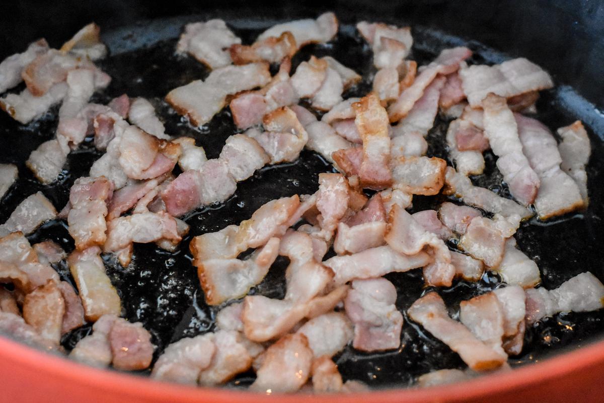 First cook the bacon until lightly crisp, and leave the drippings behind for the beef. (Audrey Le Goff)