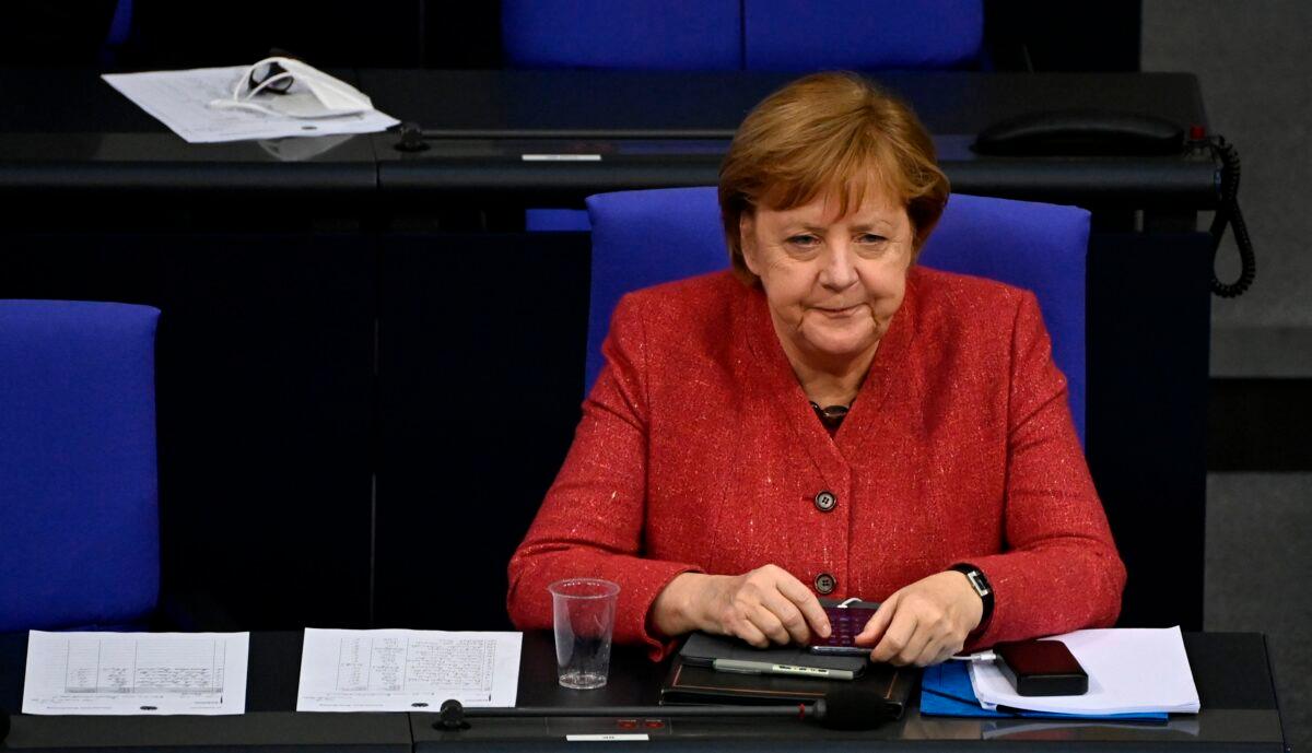 German Chancellor Angela Merkel attends a debate at the Bundestag, in Berlin on Dec. 9, 2020, (Tobias Schwarz/ AFP via Getty Images)