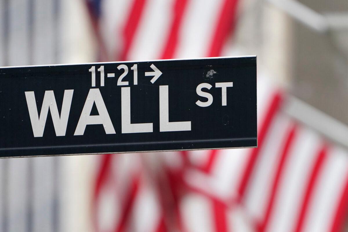 A street sign is displayed at the New York Stock Exchange in New York, on Nov. 23, 2020. (Seth Wenig/ AP Photo,File)