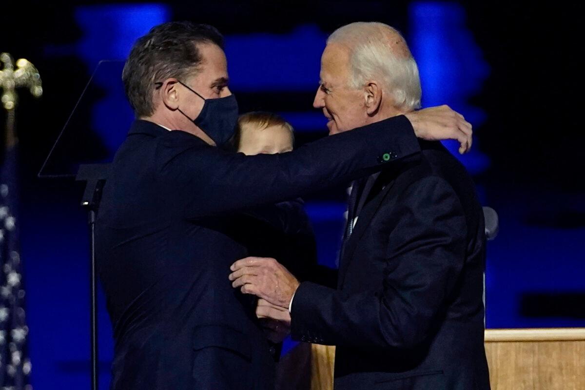  Hunter Biden (L) embraces his father, Democratic presidential nominee Joe Biden, in Wilmington, Del., on Nov. 7, 2020. (Andrew Harnik/Pool/AP Photo)