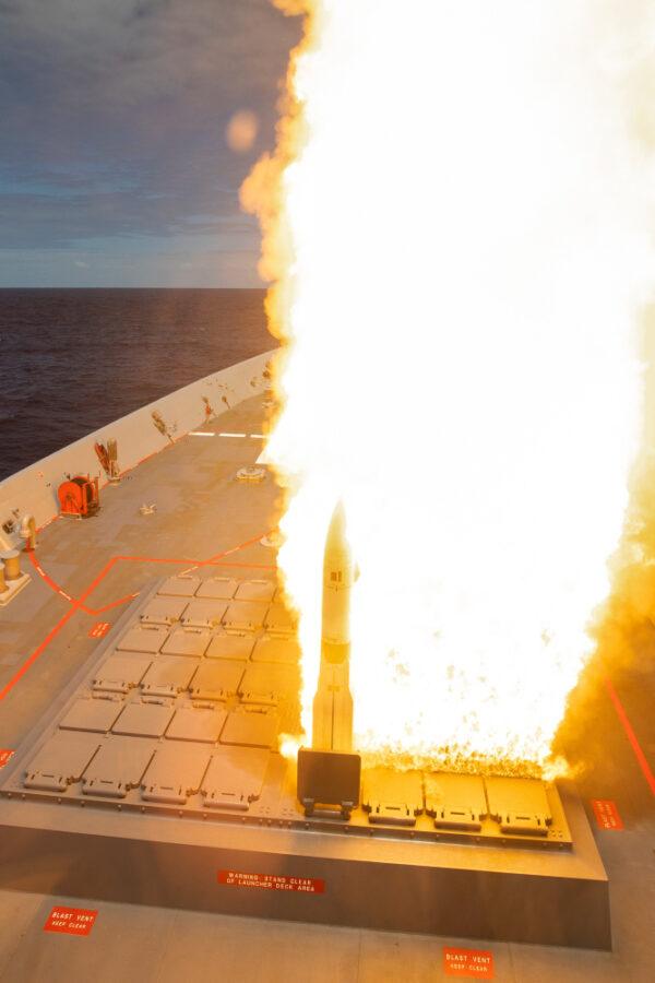 HMAS Brisbane conducts a SM-2 standard missile living firing at sea, off the coast of New South Wales. (LSIS Thomas Sawtell/ADF)