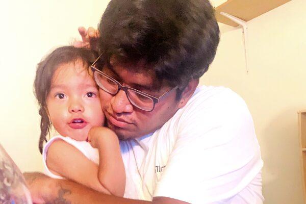 Henry Eduardo Saldana-Mejia, who was killed in a Dec. 8 car crash in Santa Ana, Calif., hugs his daughter.