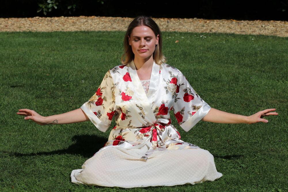 Yulia practicing the fifth exercise of the Falun Gong spiritual system. (Courtesy of Frank Wu)