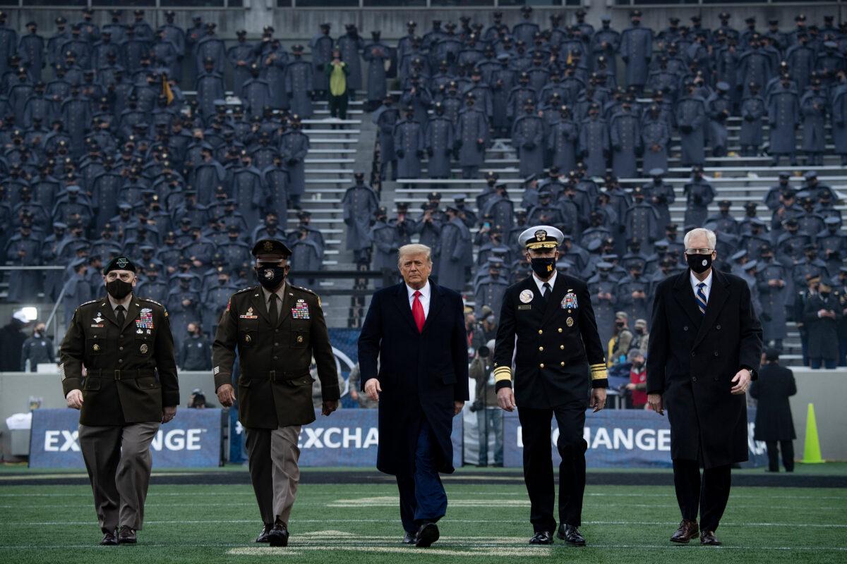 President Donald Trump walks onto the field before the start of the Army-Navy football game at Michie Stadium in West Point, N.Y., on Dec. 12, 2020. (Brendan Smialowski/AFP via Getty Images)