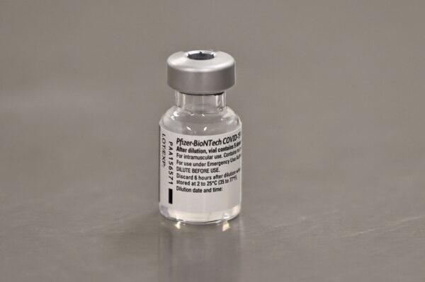A vial of the Pfizer-BioNTech COVID-19 vaccine in a file photo. (Liam McBurney/Pool via Reuters/File Photo)
