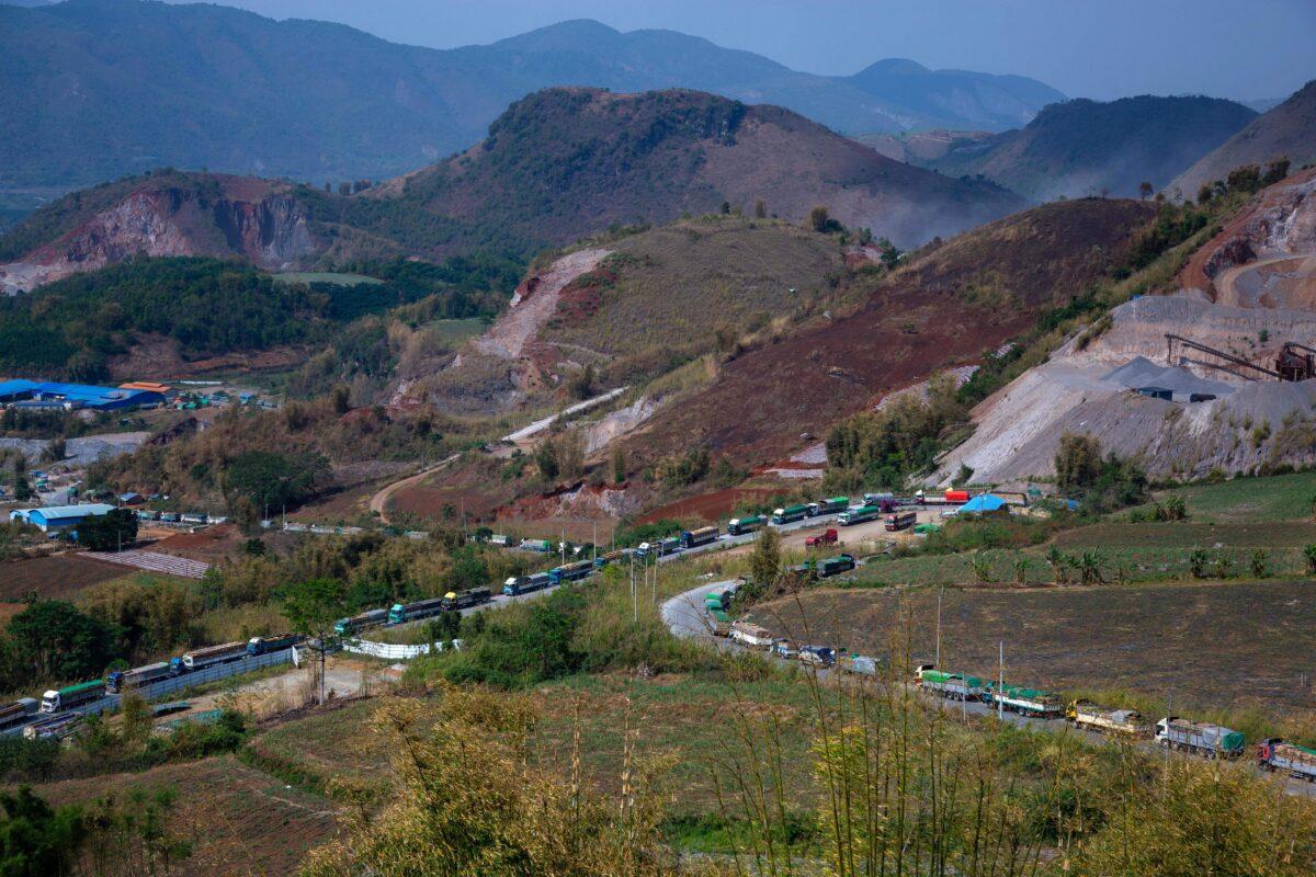 Food trucks wait to enter China near Muse, close to the Chinese border in Shan state, Burma, on April 20, 2020. (Phyo Maung Maung/AFP via Getty Images)