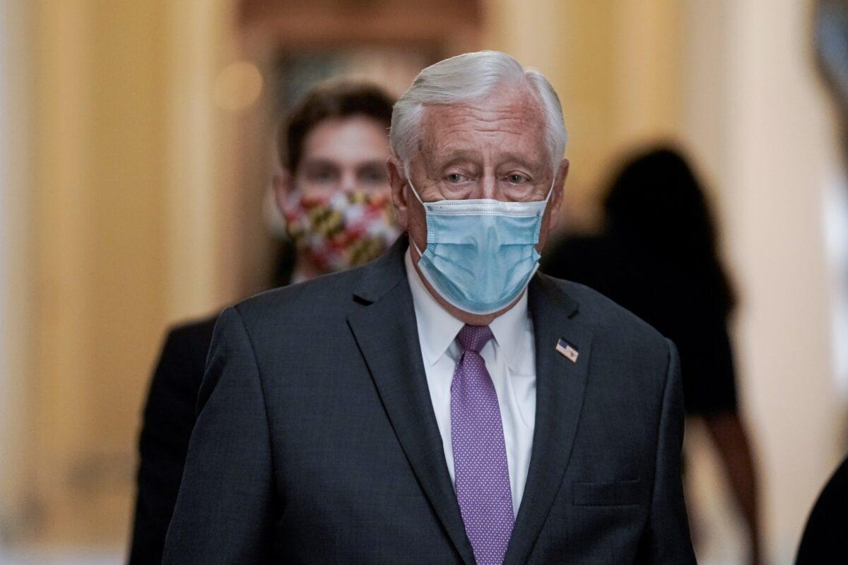 Majority Leader Steny Hoyer (D-Md.) walks in Washington on Oct. 2, 2020. (Ken Cedeno/Reuters)