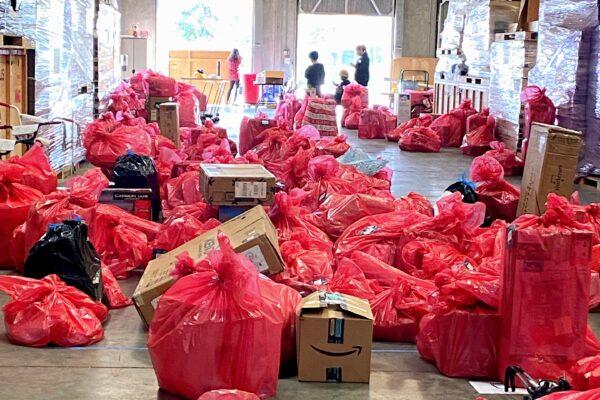 Gifts await distribution to needy families for Christmas through Families Helping Families in Huntington Beach, Calif., on Dec. 12, 2020.