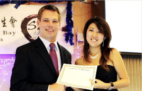 Christine Fang with then-Dublin City Councilmember Eric Swalwell at an October 2012 student event. (Screenshot/Social media)