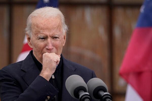 Joe Biden speaks during a drive-in rally for Senate candidates Jon Ossoff and Rev. Raphael Warnock at Pullman Yard in Atlanta, Georgia, on Dec. 15, 2020. (Drew Angerer/Getty Images)