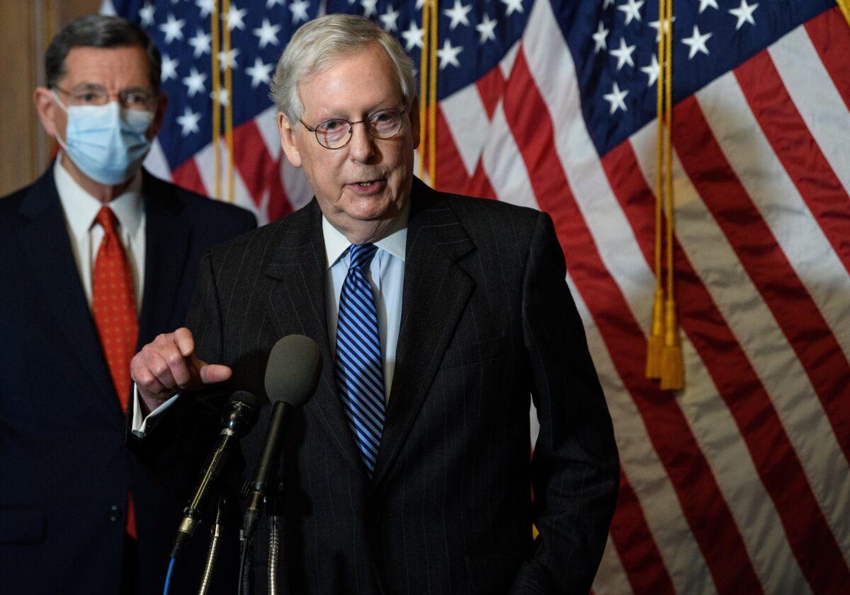  Senate Majority Leader Mitch McConnell (R-Ky.), with Sen. John Barrasso (R-Wyo.), speaks at a news conference in Washington on Dec. 15, 2020. (Nicholas Kamm/Pool/Getty Images)