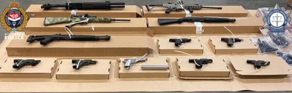 Firearms, including rifles modified for automatic fire, shotguns and pistols with “silencers” seized in Operation Juliet (Victoria Police Handout)