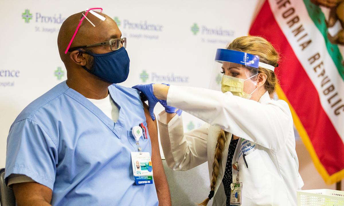 St. Joseph Hospital Workers Receive Orange County’s 1st COVID-19 Vaccines