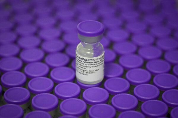 Vials of the Pfizer/BioNTech COVID-19 vaccine are seen during a vaccination clinic at the Sir Ludwig Guttmann Health and Wellbeing Centre in Stratford, England, on Dec. 15, 2020. (Leon Neal/Getty Images)