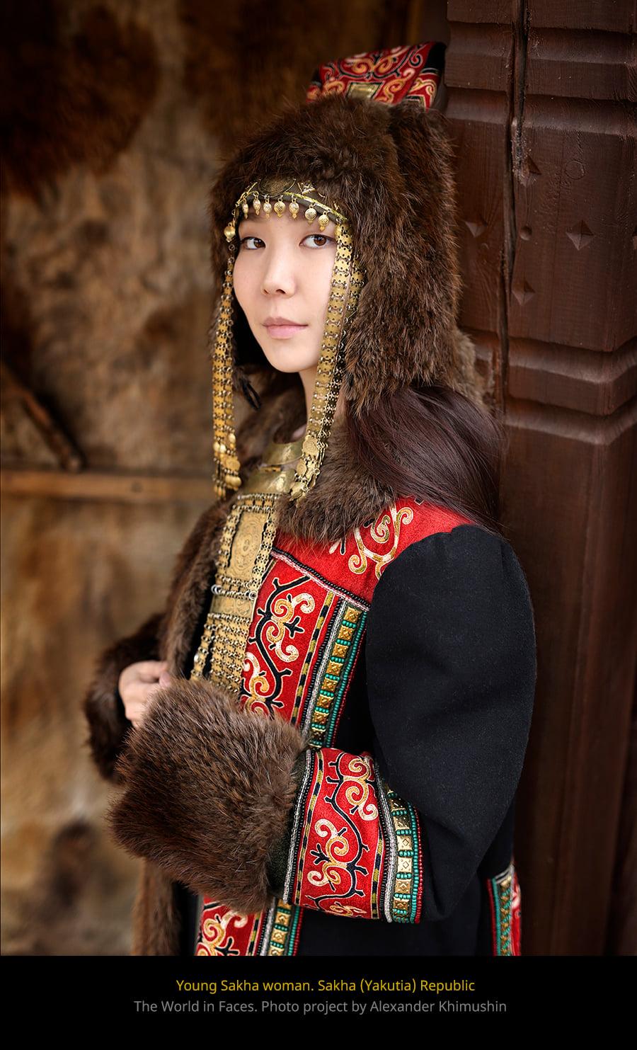 A young Sakha woman in traditional jewelry and clothing in the coldest region of the world: Sakha (Yakutia), where the photographer grew up (© <a href="https://www.facebook.com/xperimenter">Alexander Khimushin</a> / The World In Faces)