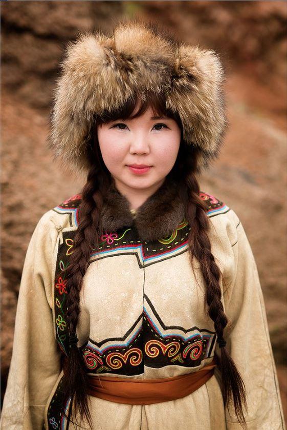 An Oroqen girl from a remote part of Inner Mongolia, related to Evenki people of Russia (© <a href="https://www.facebook.com/xperimenter">Alexander Khimushin</a> / The World In Faces)