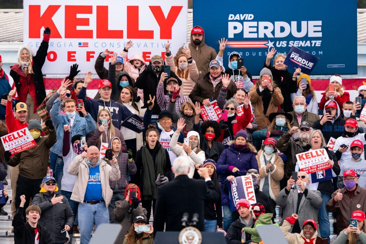 Vice President Mike Pence looks at a portion of the crowd during a Defend The Majority campaign event in Columbus, Ga., on Dec. 17, 2020. (Elijah Nouvelage/Getty Images)