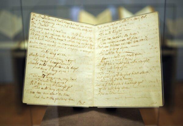 The lyrics we all sing at the stroke of midnight on New Year’s Eve. The original letter featuring the lyrics of "Auld Lang Syne" by Scottish poet Robert Burns at the Morgan Library & Museum in New York, Dec. 9, 2011. (EMMANUEL DUNAND /AFP via Getty Images)