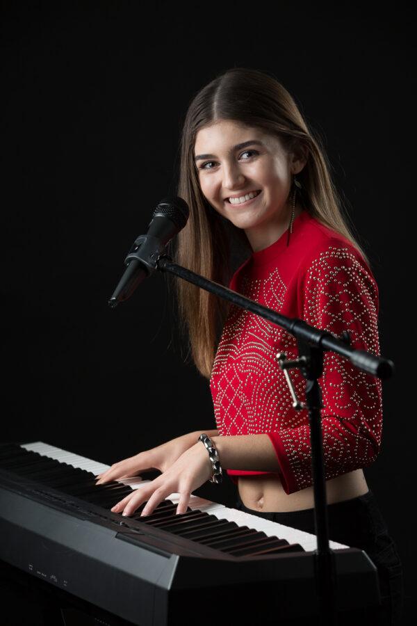 Franki Moscato recorded an online Christmas concert especially for seniors and veterans who may be isolated during this time of year. She is 15 in this photo. (Mark William)