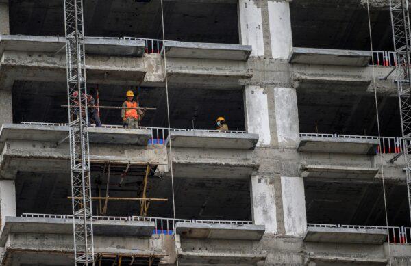 Workers are seen at a construction site in Beijing, China on Dec. 17, 2020. ( NOEL CELIS/AFP via Getty Images)